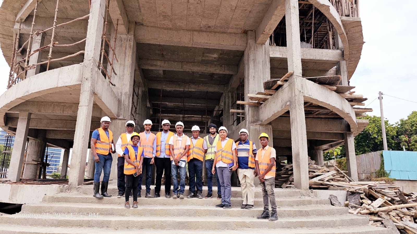 Shomax engineering team on a site inspection at a multi-storey reinforced-concrete building under construction, January 2025.